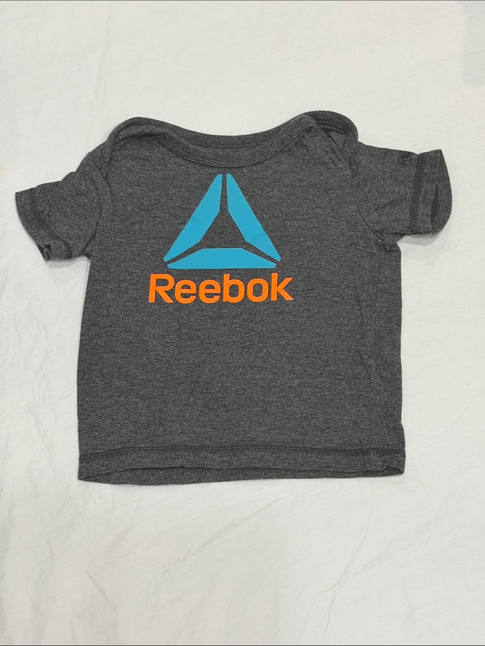 Reebok Dark Gray Tee with Blue Delta & Orange Logo
